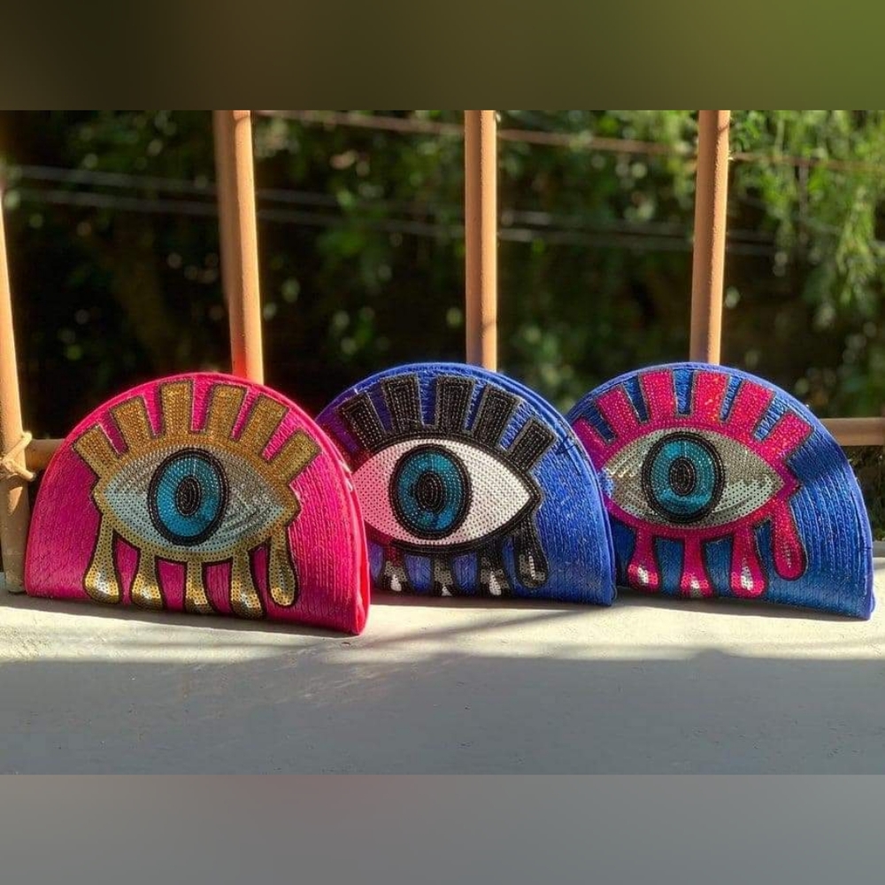 Evil eye clutches